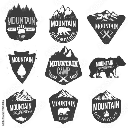 Mountain camp badges templates with mountains and trees isolated