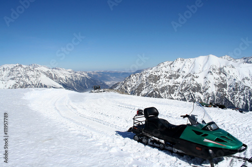 Snowmobile in the mountains of Dombai