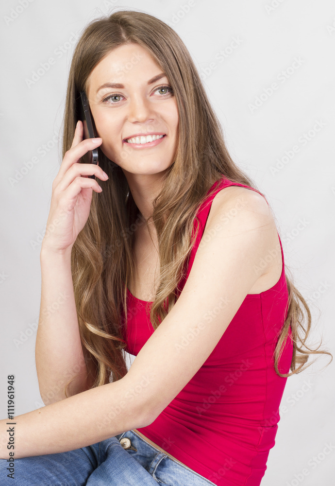 Fototapeta premium beautiful woman talking on mobile phone