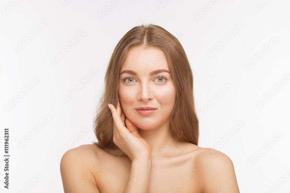 Closeup portrait of shirtless or topless lady looking at camera and touching her face over white background. Studio shot. Beauty concept. Closeup portrait of shirtless or topless lady looking at camera and touching her face over white background. Studio shot. Beauty concept.
