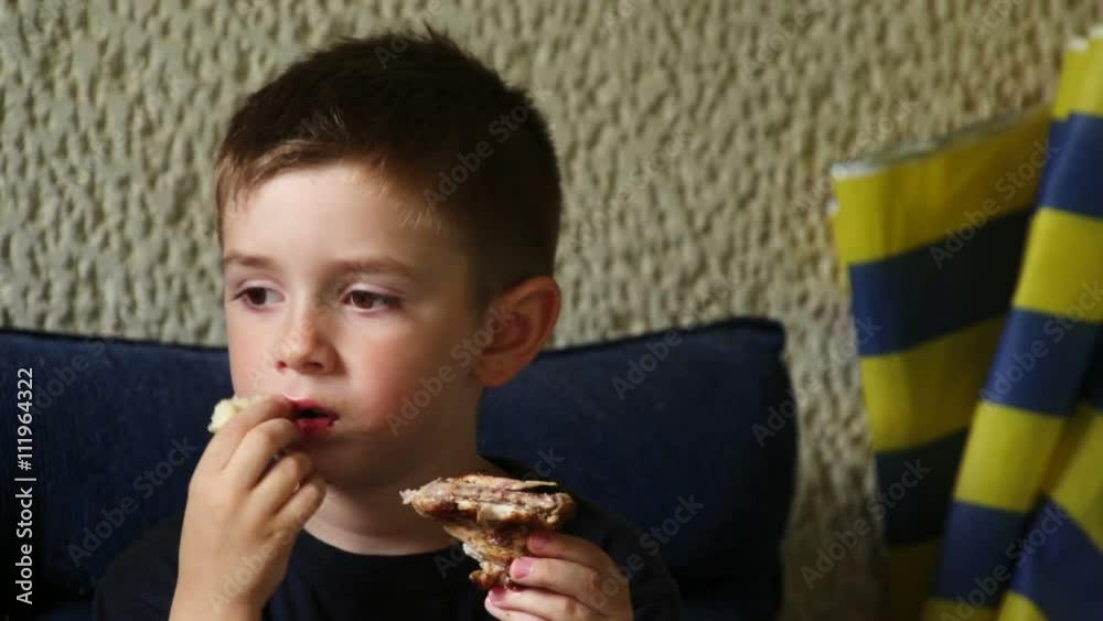 Young boy eating
Young boy eating