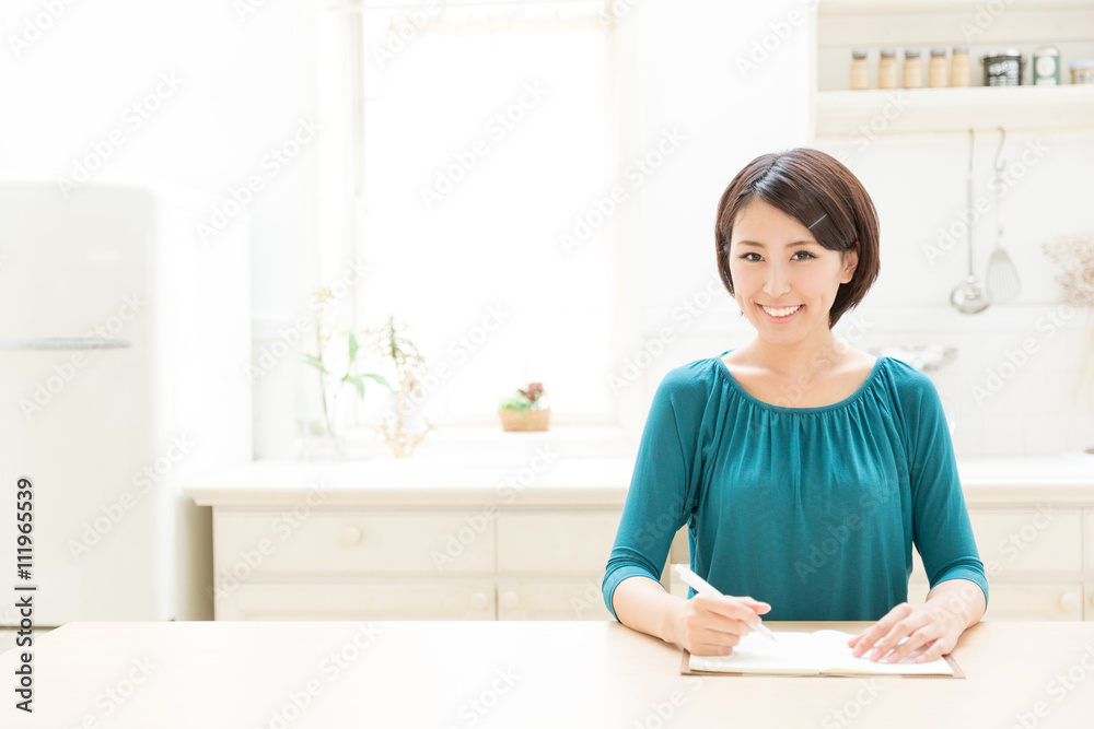 young asian woman in the kitchen
