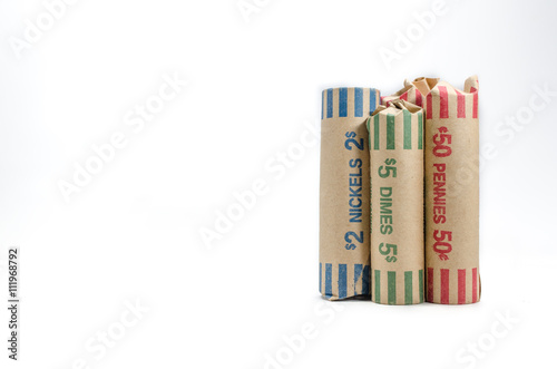 Three rolls of money change wrapped in cointainer