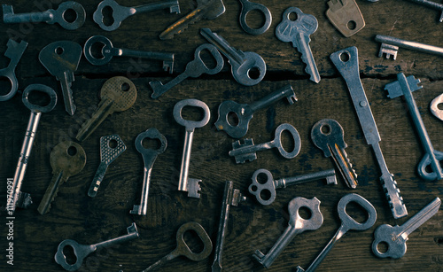 Set of keys on wood background