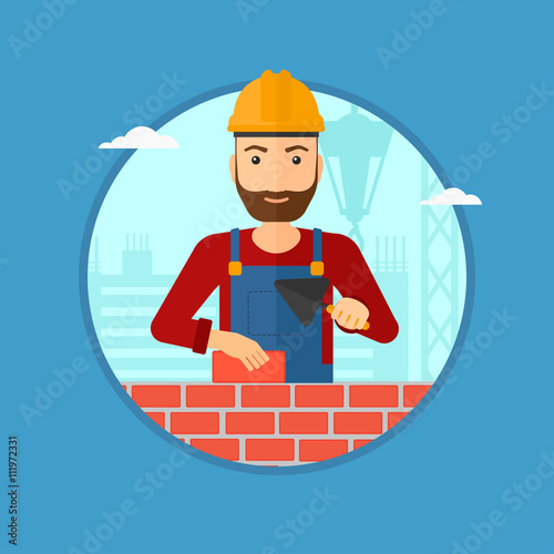 Bricklayer with spatula and brick.