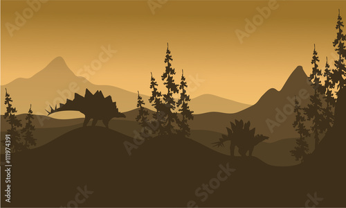 Landscape Stegosaurus silhouette in hills