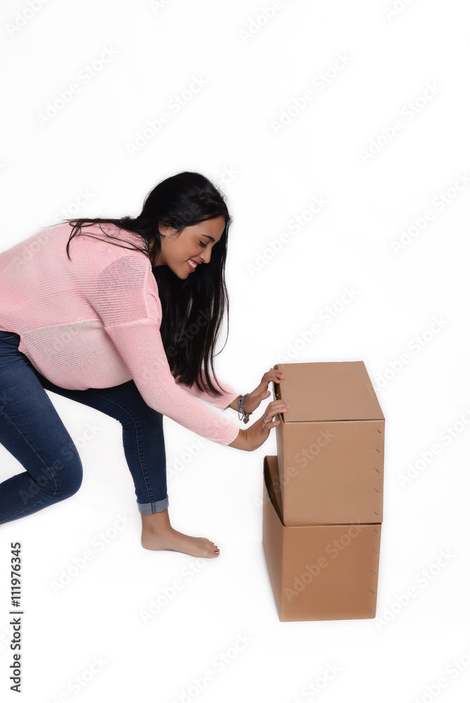 Woman opening a box Woman opening a box