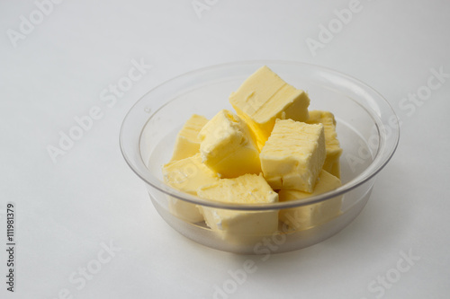 butter on a transparent plate