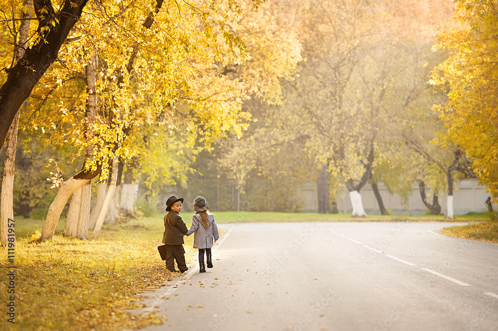 Autumn romantic journey of two young children Autumn romantic journey of two young children