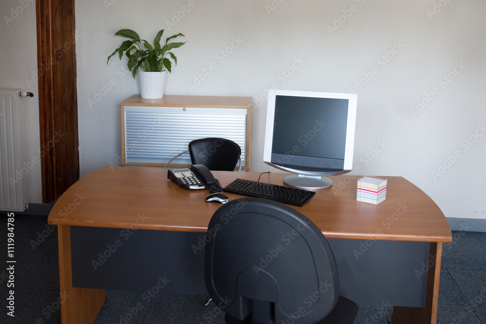 Manager Table with Desktop Computer Inside the Office. Manager Table with Desktop Computer Inside the Office.