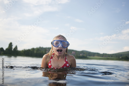 Young girl swiming photo