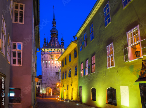 Illuminated architecture of the artistic monument citadel in Sighisoara, Sibiu - Romania