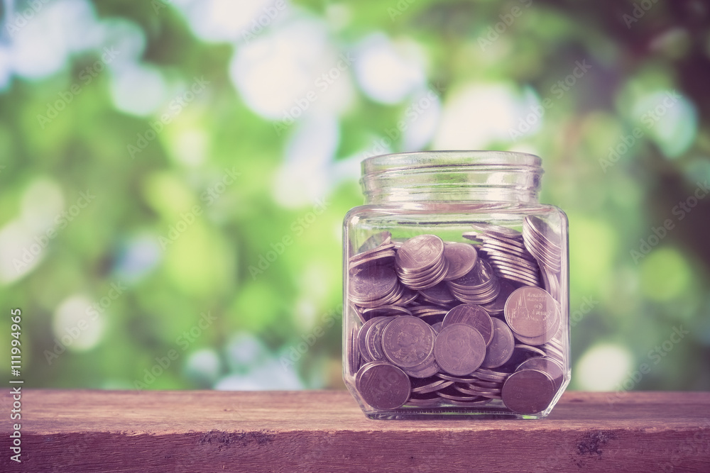 save money for investment concept money in the glass with filter save money for investment concept money in the glass with filter