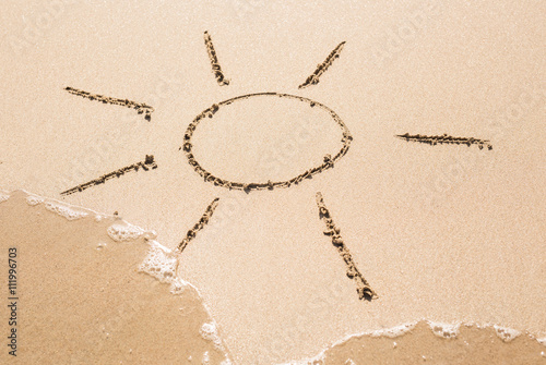 Sun pictured on the sand of coastline