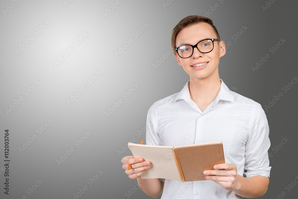 Handsome thoughtful man reading a note Handsome thoughtful man reading a note