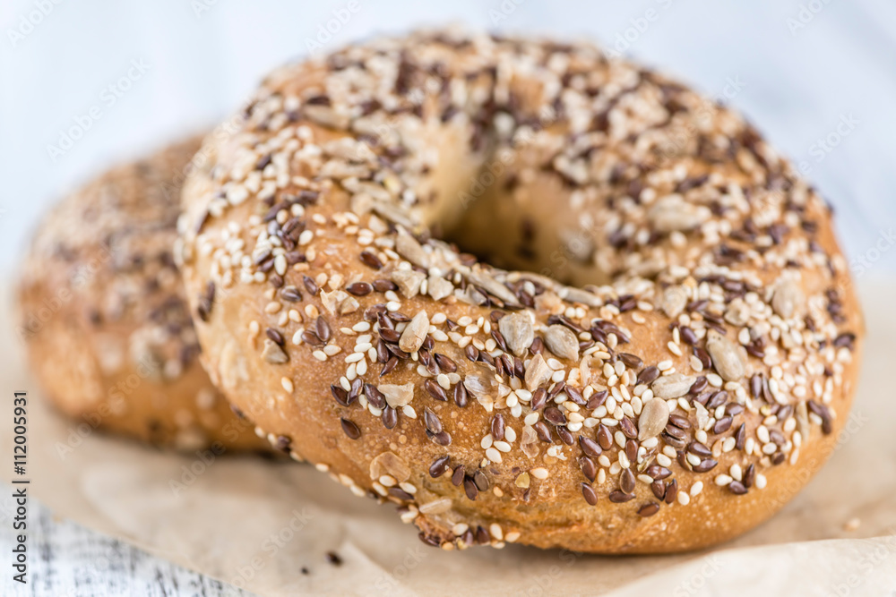 Wholemeal Bagels on wooden background