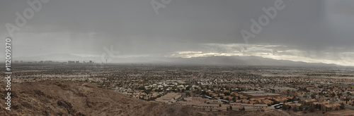 Las Vegas Aerial Panorama with city skyline, mountain and streets.
