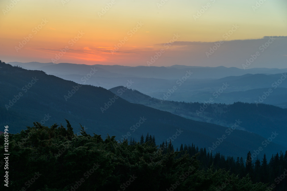 mountain ranges at sunrise