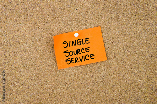SINGLE SOURCE SERVICE written on orange paper note