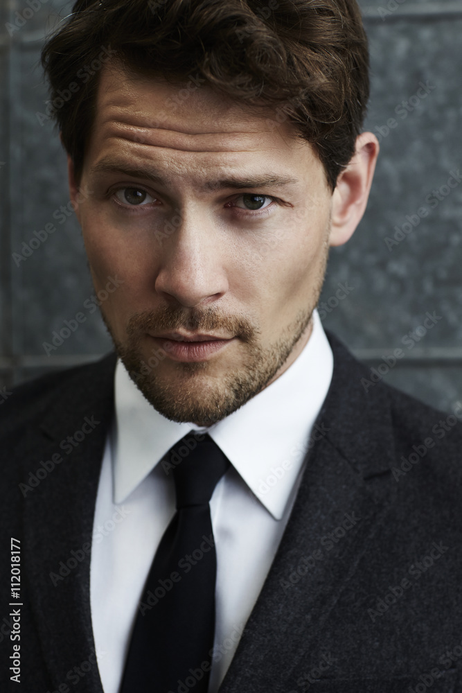 Handsome man in black business suit, portrait Handsome man in black business suit, portrait