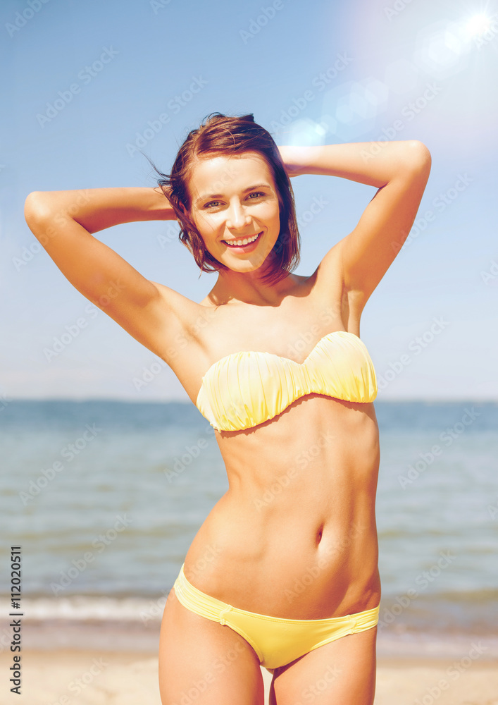 girl posing on the beach girl posing on the beach