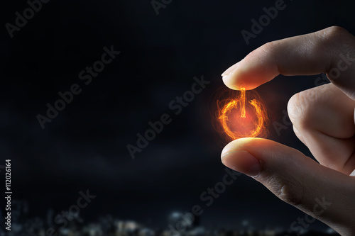 Power symbol between fingers