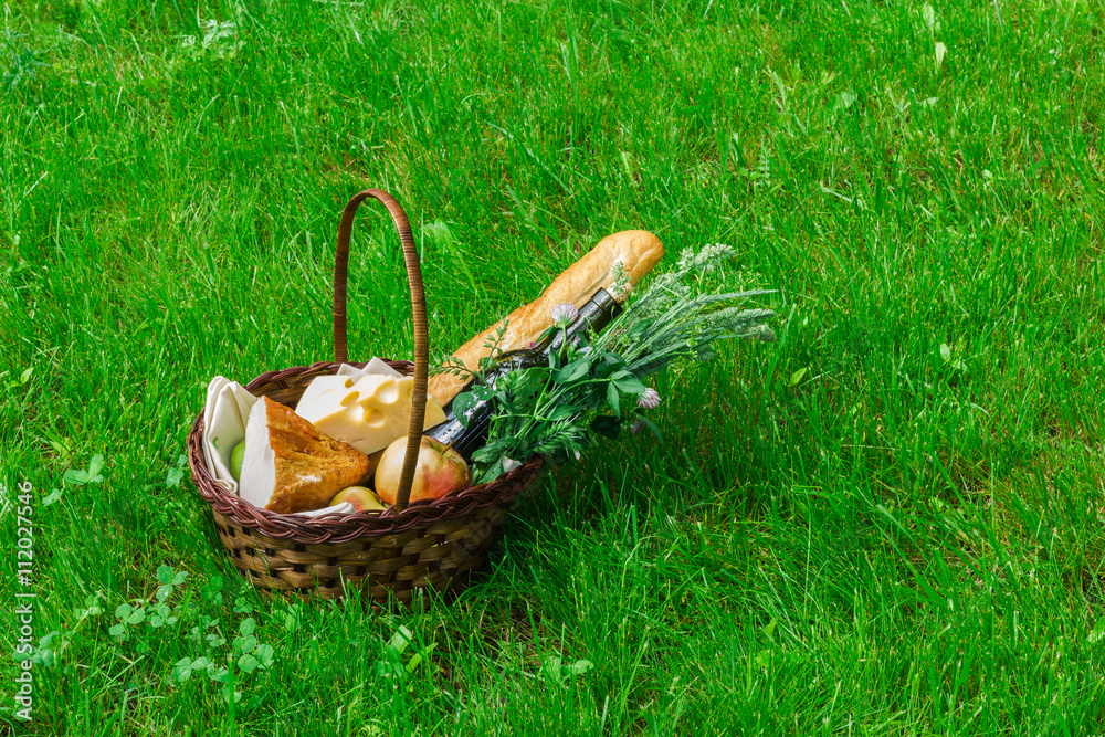 basket with food for a picnic basket with food for a picnic