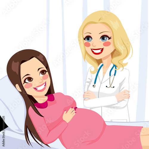 Beautiful young brunette pregnant woman lying on hospital bed being visited by a female doctor