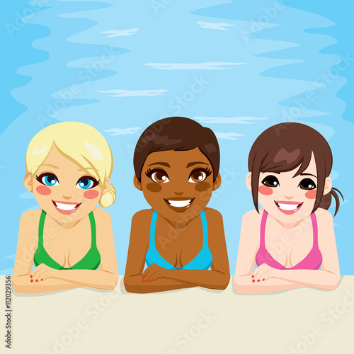Multi ethnic group of three young women in swimming pool with positive smiling face expression