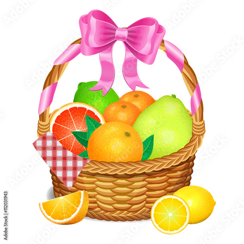 Wooden wicker basket with fruits isolated on a white background.