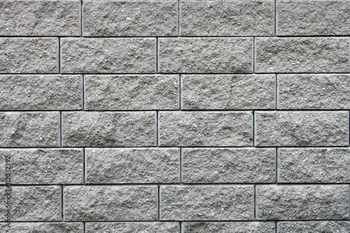Detail of building a new house, a brick wall, background of brick