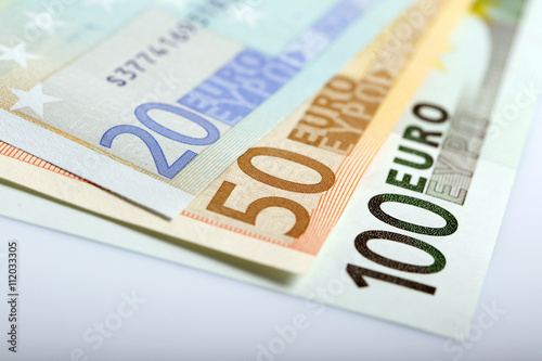 Closeup of banknotes and coins