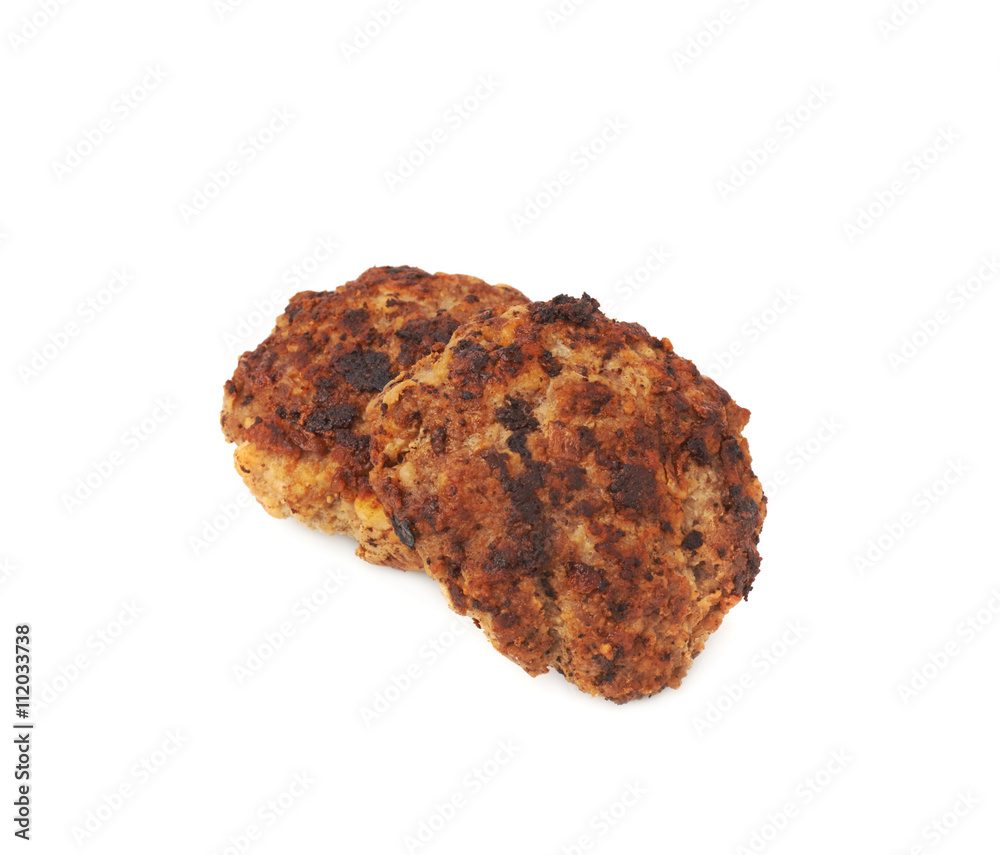 Couple of small hand made cutlets isolated over white background Couple of small hand made cutlets isolated over white background