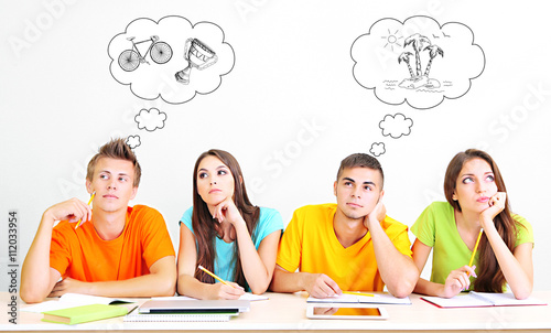 Four dreaming students. Vec...