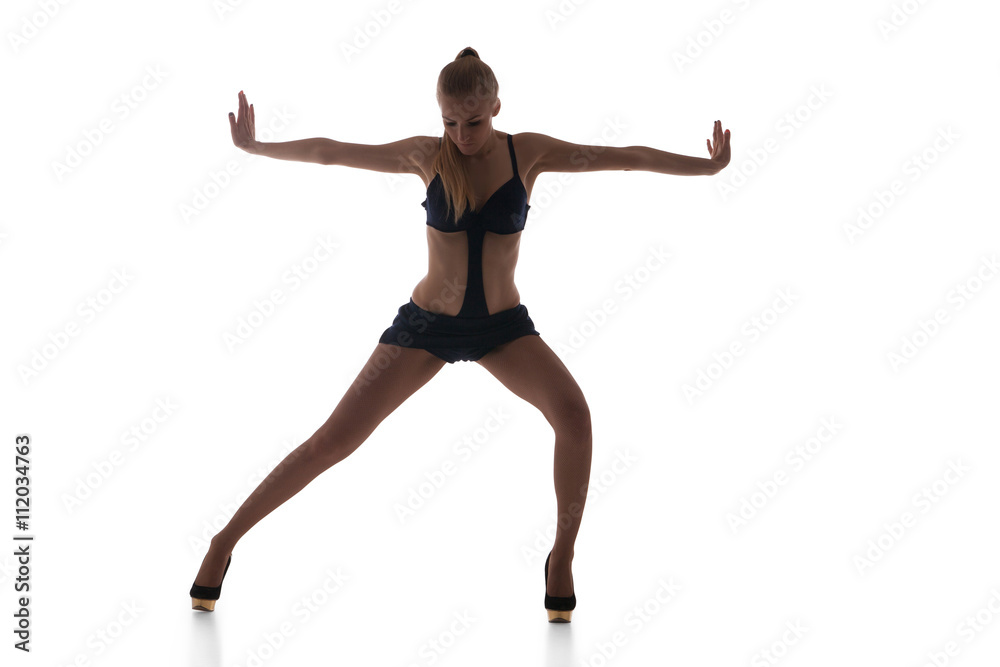 Slim go-go dancer performing on white background Slim go-go dancer performing on white background