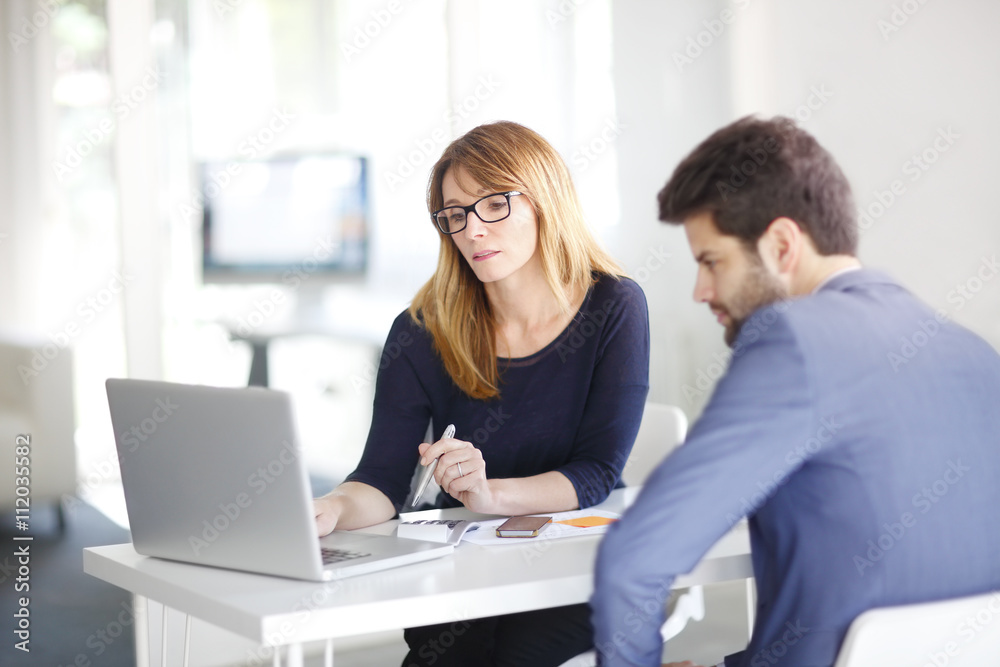 Financial advisor with client Financial advisor with client