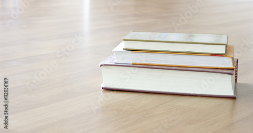 book on wooden table