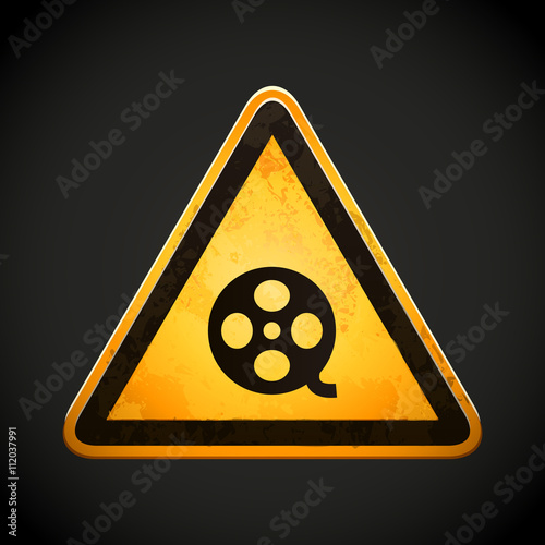 danger sign with film icon