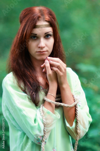 Interesting,unhappy,upset,serene,sorrowful,close-up,serious,thoughtful,pensive,tranquil,sad,soft,sorrowful,melancholy Mavka,captive,slave,involuntary,victim.Heroine from movies and fairy tales,upset photo