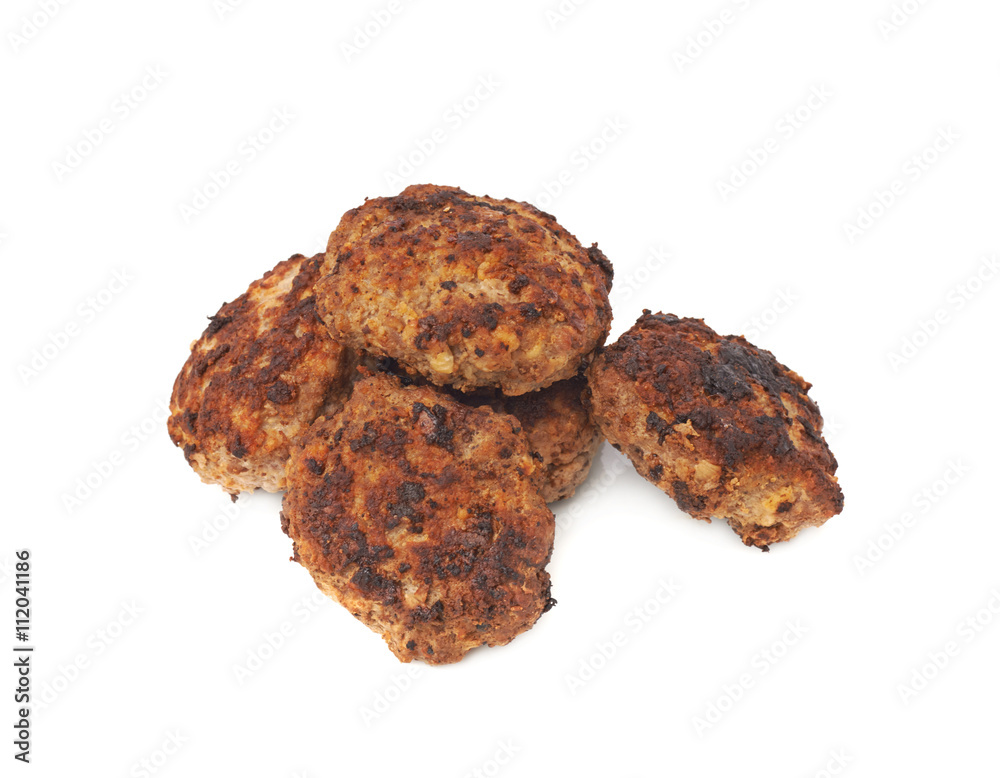 Pile of small hand made cutlets isolated over white background Pile of small hand made cutlets isolated over white background