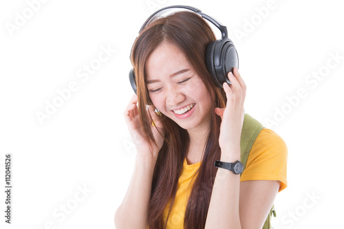 happy teen girl listening to music, full length, isolated on whi