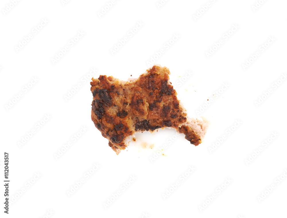 Fototapeta premium Bitten single small hand made cutlet isolated over white background