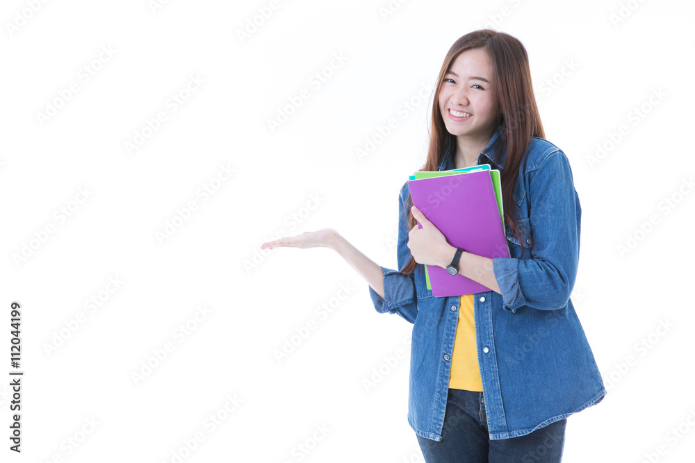 Young asian student girl with book. Isolated on white background Young asian student girl with book. Isolated on white background