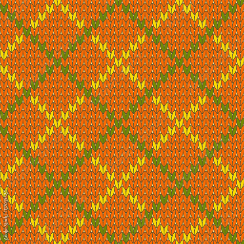 Knitted diamond shape seamless pattern in green and orange, vector