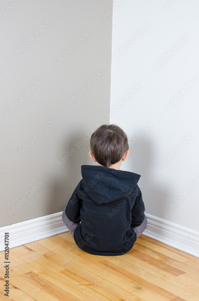 Kid facing corner Kid facing corner