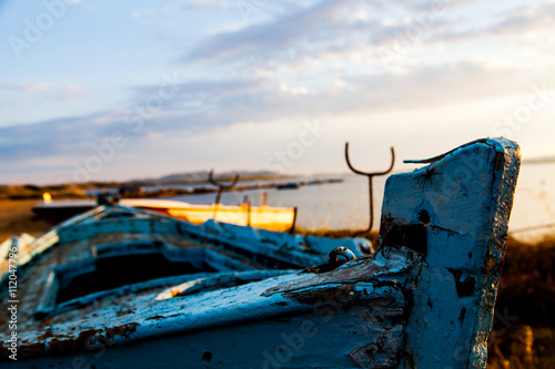 Fishing boat at sunset