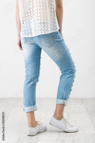 Young woman in jeans clothes