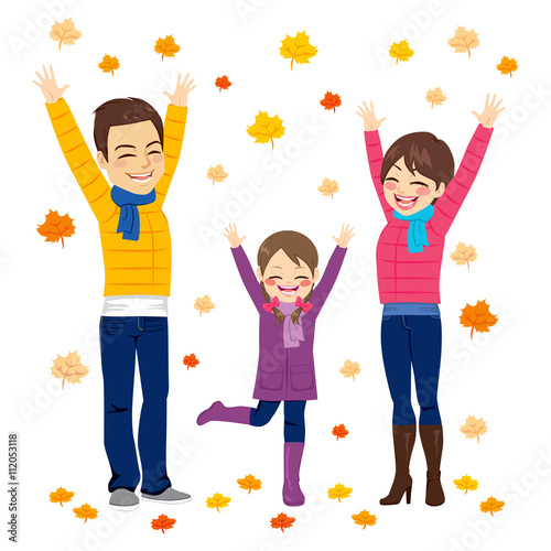 Happy family together on autumn playing with leaves