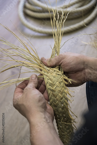 Espartero working with esparto with his hands photo