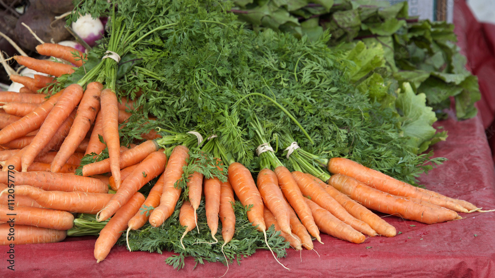 Whole natural carrots at local farmers market northern california Bay Area Whole natural carrots at local farmers market northern california Bay Area